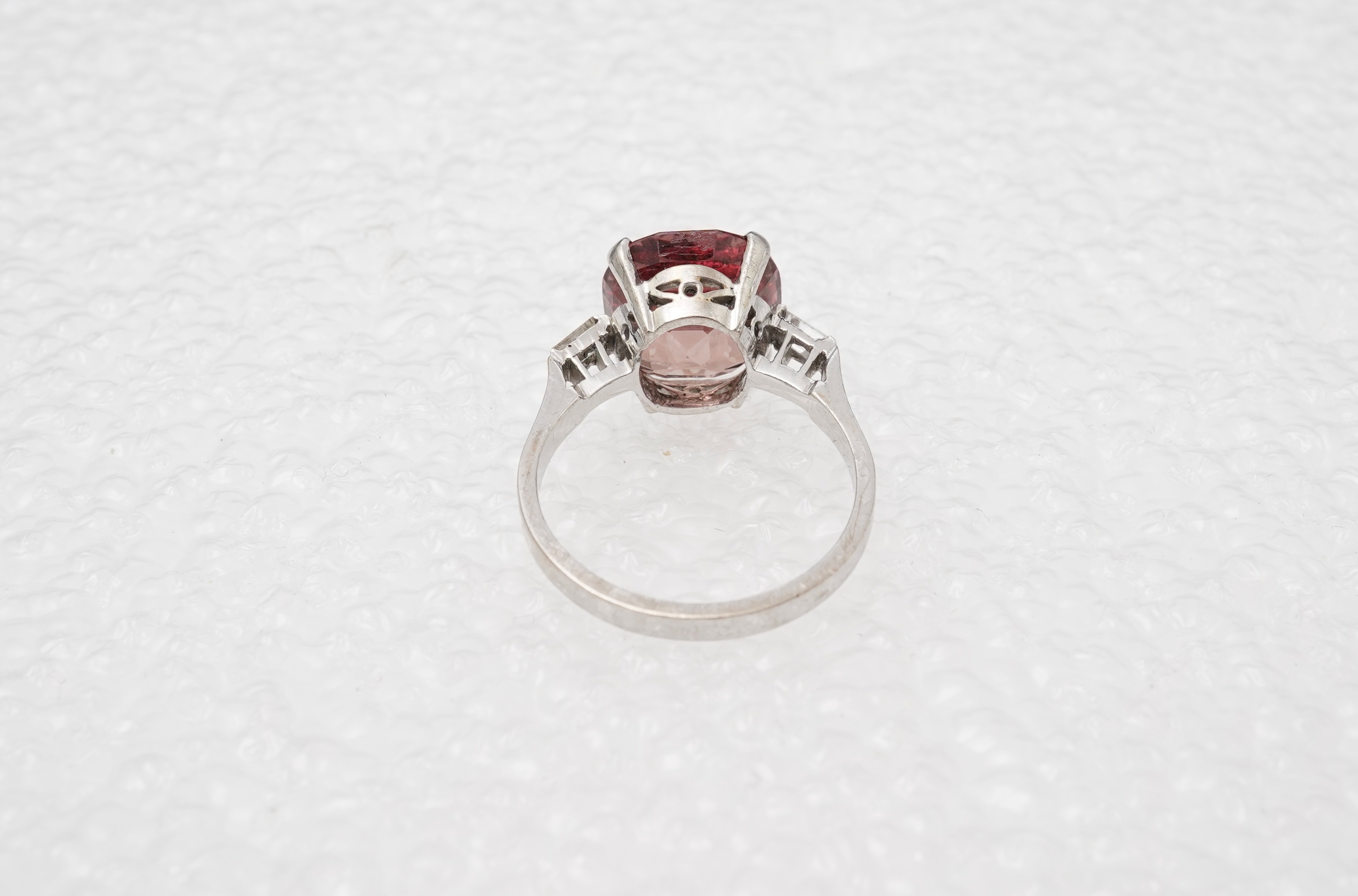 A garnet and diamond ring